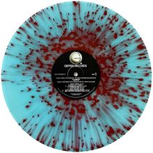 Text: "Geffen Records", "Side 1", "JAWS". Vinyl-Schallplatte mit rot-blauem Muster und schwarzem Zentrum.