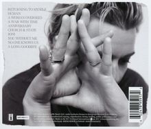 Eine Liste von Songtiteln: "RETURNING TO MYSELF", "HUMAN", "A WOMAN OVERSEES", "A WAR WITH TIME", "ANNIVERSARY", "CHURCH & STATE", "JONI", "YOU WITHOUT ME", "NO ONE KNOWS US", "A LONG GOODBYE". Darunter ein schwarz-weiß Foto, das eine Person zeigt, die Hände vor dem Gesicht verschränkt.
