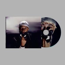 Texte „Exodus Someday“. Person mit weißem Kopftuch hält einen schwarz-weißen Schmetterling vor das Gesicht. CD-Hülle und CD.