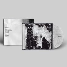 Texte: "Space Afrika Quiet Storm" und Trackliste. CD-Cover mit abstraktem Schwarz-Weiß-Muster.