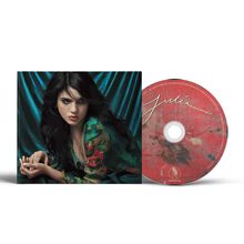 Der Text "Julia" steht in geschwungener Schrift auf einem roten CD-Cover. Eine Frau liegt vor einem blauen Hintergrund.
