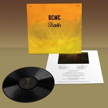 BCMC Stash. Vinylplatte vor einem gelben Albumcover mit Trackliste auf einem Blatt.