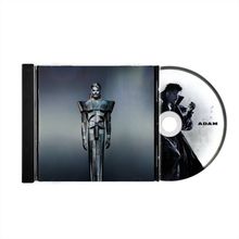 Der Text "ADAM" steht auf der CD. Eine Figur in metallischer Rüstung ist zentral dargestellt.