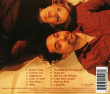 Die Texte sind eine Songliste von 1 bis 12, darunter "Bonfire Song", "Getaway Car" und "Hypocrite". Zwei Personen liegen Kopf an Kopf.