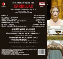 "PAUL HINDEMITH CARDILLAC. Charaktere: Cardillac, Tochter. Chor/Orchester der Wiener Staatsoper. Dirigent: Cornelius Meister. Rechts eine Frau in weißem Kleid vor goldenem Hintergrund."
