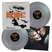 "The Bride!" in orange, Musik von Hildur Guðnadóttir. Zwei Vinyl-Schallplatten und ein Bild eines Paares.