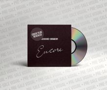 "PRE-SALE VISUAL" und "COVER TO BE REVEALED". Dunkle Hülle mit CD. Text: "TOKIO HOTEL Encore".