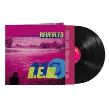 "THE BLACK SESSIONS," "REVEALED," "R.E.M." in großen Buchstaben auf einem pink-violetten Albumcover mit Schallplatte.