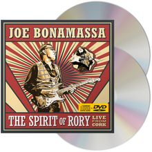 Text: "JOE BONAMASSA", "THE SPIRIT OF RORY", "LIVE FROM CORK". Illustration mit Gitarrist und stilisiertem Hintergrund.