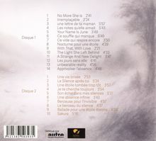 Texte in zwei Listen: 
- Disque 1: 14 Titel wie "No More She is" und "Irremplaçable".
- Disque 2: 10 Titel wie "Une vie brisée" und "Le Silence après toi".