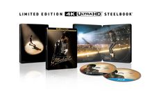 LIMITED EDITION 4K ULTRA HD STEELBOOK oben. Verpackung mit tanzendem Mann auf Bühne, zwei CDs darunter.