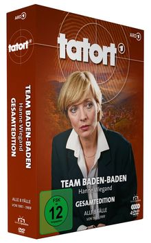 „TEAM BADEN-BADEN Hanne Wiegand GESAMTEDITION, alle 8 Fälle von 1981-1988“. Frau in Anzug, ruhig dreinblickend.