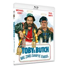 „TOBY & BUTCH: WIE ZWEI SANFTE ENGEL“. Zwei Männer in kühner Pose, einer mit Wurstketten, Heiligenscheine über den Köpfen.