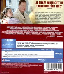 „IN DIESER HARTEN ZEIT EIN TOLLER FILM FÜRS HERZ.“ Ein Mann und ein Mädchen sitzen beisammen. Blu-ray-Hülle mit Infos.