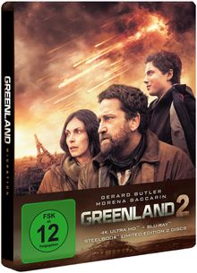 „Greenland 2", FSK 12, Schauspieler vor zerstörtem Eiffel-Turm. Feurige Trümmer am Himmel, dramatische Szene.
