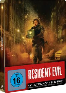 Text: "RESIDENT EVIL, FSK 16, 4K ULTRA HD + BLU-RAY, STEELBOOK LIMITED EDITION." Szene: Eine Person rennt mit einem Erste-Hilfe-Koffer.