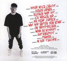 Ein Mann in schwarzem T-Shirt, daneben roter Text: "Phase 1: Immer noch Chaos, Phase 2: Lieben lernen" usw. bis Phase 11.