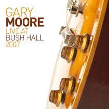 Text: "Gary Moore Live at Bush Hall 2007". Abgebildet ist ein Teil einer E-Gitarre mit Drehreglern in Nahaufnahme.