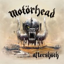 "Motörhead" und "aftershock", Illustration eines furchterregenden Monsters mit Helm und riesigen Stoßzähnen in einer Wüstenlandschaft.