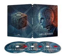 "Hellraiser" steht mehrmals auf einem Steelbook und drei Discs. Dunkle, mystische Designs mit Würfel und gesichtslosem Charakter.