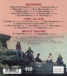 Titel von 21 Songs in drei Kategorien: "Rainbow," "C'est La Vie," "Bonus Tracks." Unten ein Foto von vier Personen auf Felsen.