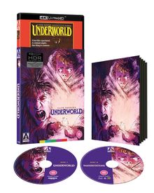 Die Texte "UNDERWORLD" und "Transmutations" sind zu sehen. Cover zeigt zwei furchterregende Gesichter. DVD-Verpackung.