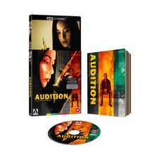 "Audition", "A Film by Takashi Miike". DVD-Hülle, Buch und Disc. Frau mit Spritze und Mann auf Stuhl abgebildet.