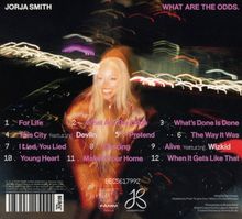 Albumtitel: "What Are The Odds." Lieder wie "For Life", "This City" mit Devlin, "Alive" mit Wizkid. Blondes Model im Hintergrund.