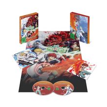 Zwei rote Discs und eine Verpackung, alle mit „ORIENT“ beschriftet. Anime-Illustrationen von Charakteren in dynamischen Posen.