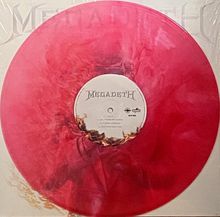 "MEGADETH" auf roter Vinylplatte, zentrale Texte: Seite B, Songtitel "4. L. T. T. D. K., 5. P. P., 6. A. B. D."