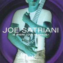 Junger Mann mit Gitarre, Text: "JOE SATRIANI IS THERE LOVE IN SPACE?", stilisiertes Porträt in negativem Farbschema.
