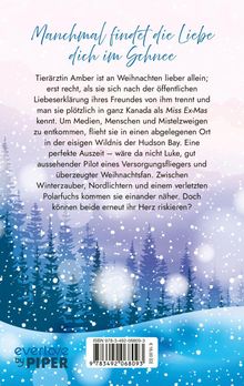 "Manchmal findet die Liebe dich im Schnee." Tierärztin Amber flieht nach Kanada. Winterliches Waldmotiv mit Schneefall.