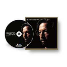 CD und Hülle mit der Aufschrift "Eric Clapton - Journeyman Deluxe Edition", zeigt ein ernstes Gesicht im Halbprofil.