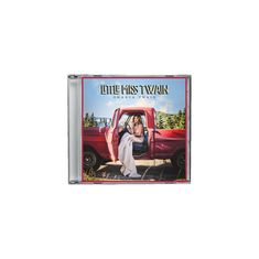 „LITTLE MISS TWAIN, SHANIA TWAIN“. Eine Frau sitzt in einem roten Truck vor einer Waldkulisse. CD-Cover.