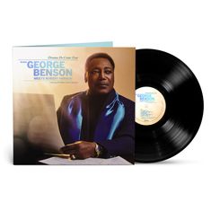 "Dreams Do Come True", "When George Benson Meets Robert Farnon". Ein Mann in Dunkelblau mit Notenblättern.