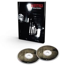 Text: "HAUNTINGS Richard Barbieri." Schwarz-weißes Coverbild mit einer Person unter Laternen, zwei CDs liegen davor.