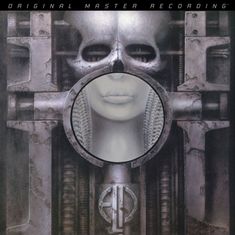 „Original Master Recording“ oben; metallisches Schädel-Design mit blassem Gesicht, ELP-Logo unten, Science-Fiction-Ästhetik.