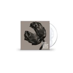 Text: "PET SHOP BOYS RELEASE". Schwarze Blume auf grauem Hintergrund, CD-Hülle leicht sichtbar.