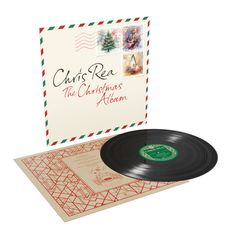 Vinylalbum "Chris Rea The Christmas Album" mit weihnachtlichem Cover und Briefmarkenmuster.