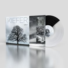 "KIEFER SUTHERLAND GREY". Schallplattenhülle mit Baum und abstrahierten Bildern. Die Schallplatte ist schwarz-weiß.