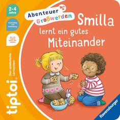 "Smilla lernt ein gutes Miteinander". Zwei Kinder sitzen am Boden und teilen Kekse. Ein Mädchen und ein Junge sind zu sehen.