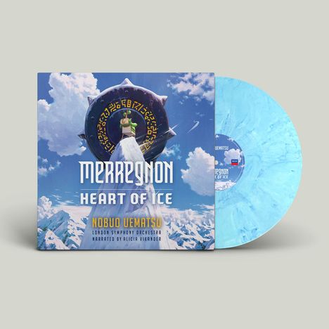 "Merregnon Heart of Ice" steht in großen Buchstaben. Eine Person vor einem verzierten Rad, umgeben von verschneiten Bergen.