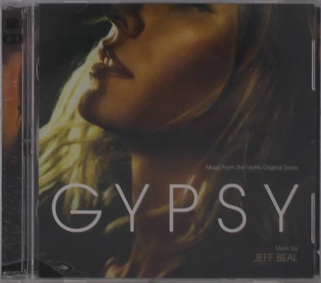 "GYPSY" und "Music by Jeff Beal" auf einem CD-Cover. Nahaufnahme eines Gesichtes mit leicht geneigtem Kopf.