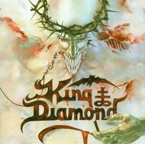 "King Diamond" in geschwungener Schrift, darüber ein grünes, bedrohliches Gesicht mit Dornenkrone, darunter eine Hand.