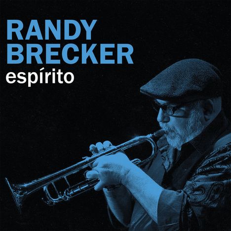 "RANDY BRECKER espírito" in blauer Schrift auf schwarzem Hintergrund. Ein Mann spielt Trompete, trägt eine Mütze.