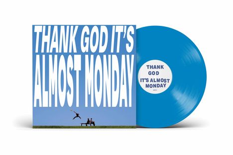 "THANK GOD IT'S ALMOST MONDAY" auf blauem Vinyl und Cover, mit springender Figur im Himmel.