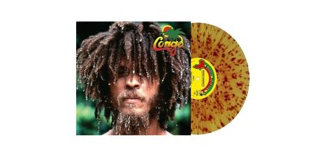 Text: "Congo". Ein Mann mit Dreadlocks, Tropfen an den Haaren. Schallplatte in Gelb mit roten Spritzern. Tropisches Motiv.
