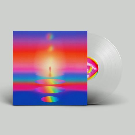 Ein farbenfrohes Albumcover mit einer Silhouette in der Mitte, umgeben von Regenbogenkreisen und einem transparenten Vinyl.