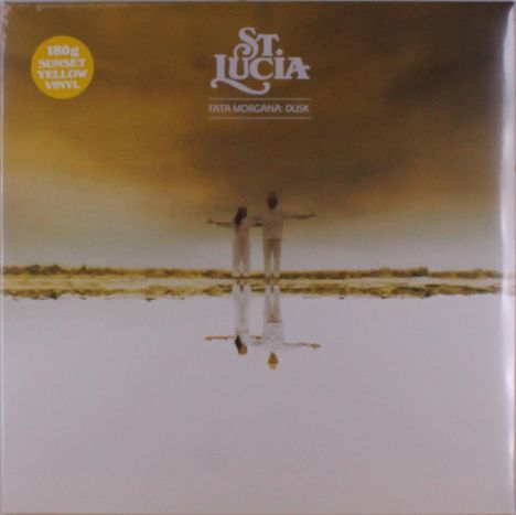 Text: "St. Lucia", "Fata Morgana: Dusk", "180g Sunset Yellow Vinyl". Zwei Personen stehen am Wasser, das Bild spiegelt.