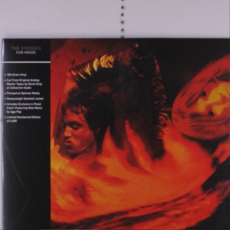 Links oben: "THE STOOGES FUN HOUSE". Daneben ein verschwommenes, rot-orange Bild mit Menschen.